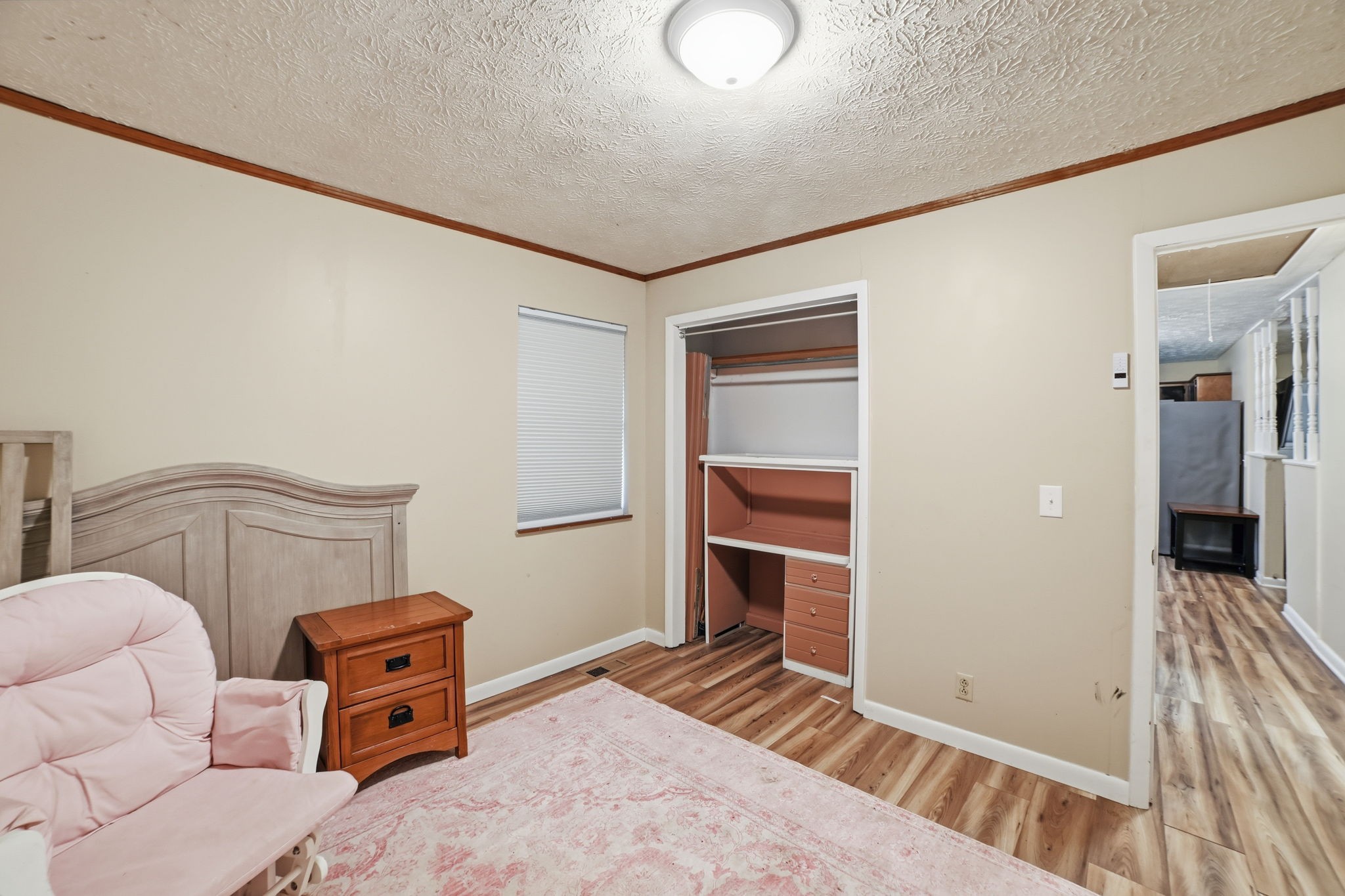 428 Scarborough Hollow Road Stewart, TN 37175 - Photo 21 of 28 a bedroom with furniture and a window