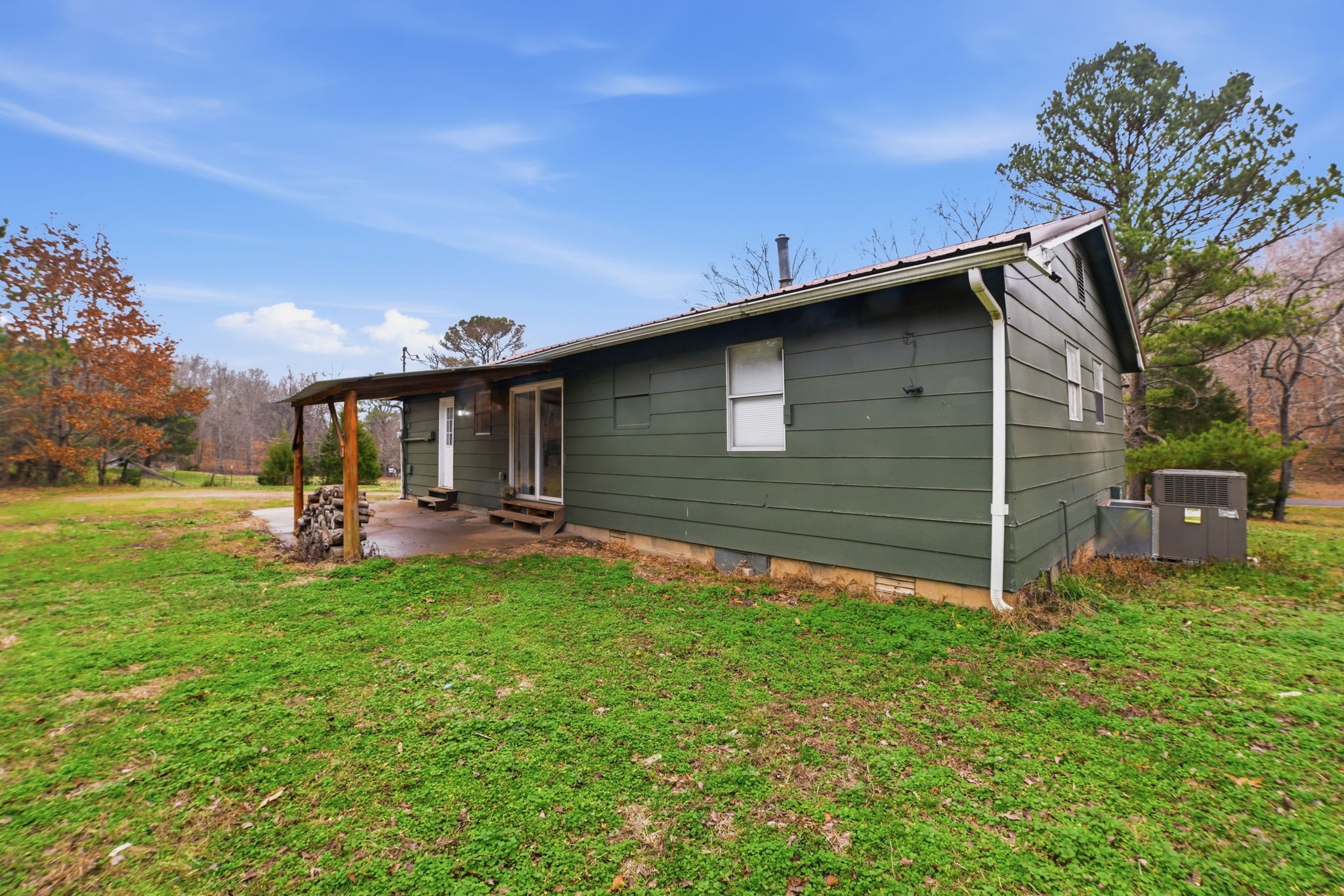 428 Scarborough Hollow Road Stewart, TN 37175 - Photo 8 of 28 a view of a house with backyard and sitting area