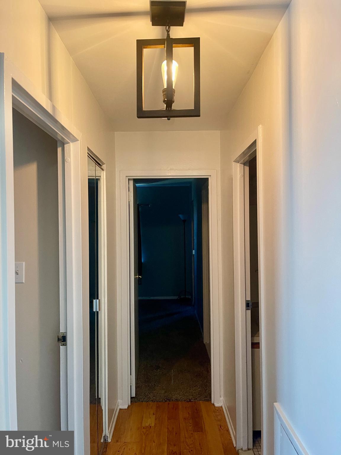 60201 Delaire Landing Road, Unit 201 Philadelphia, PA 19114 - Photo 16 of 49 a view of a hallway with wooden floor