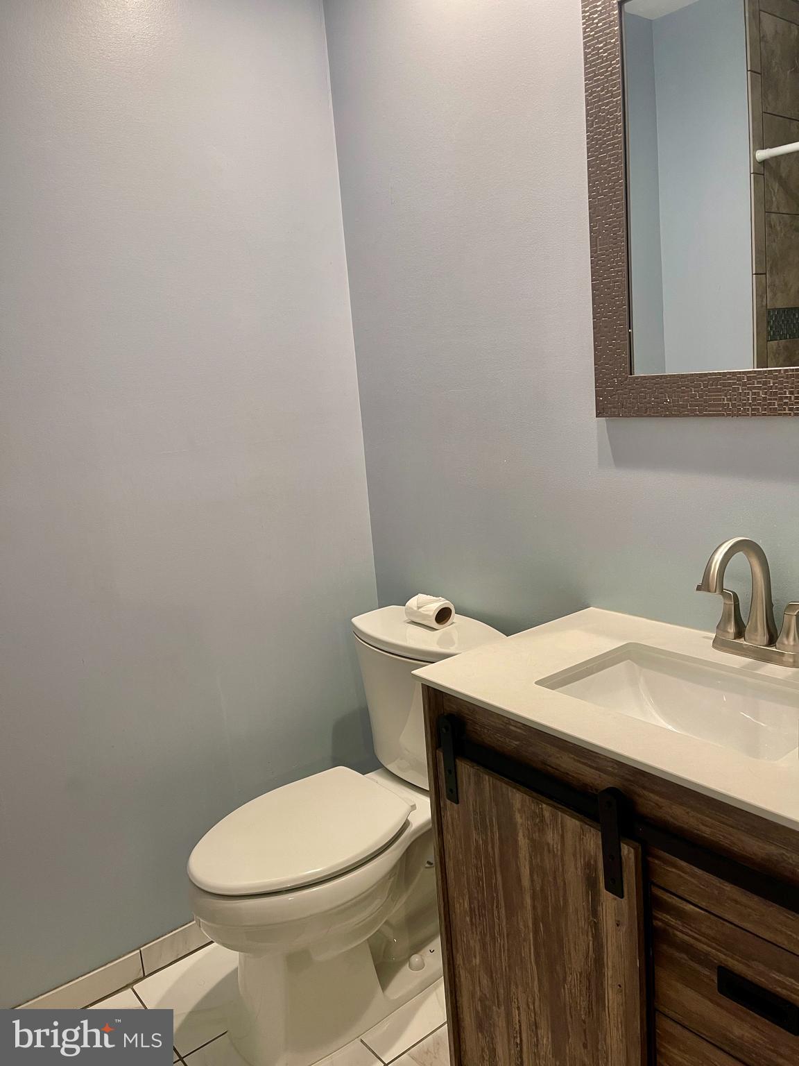 60201 Delaire Landing Road, Unit 201 Philadelphia, PA 19114 - Photo 26 of 49 a bathroom with a sink and a toilet