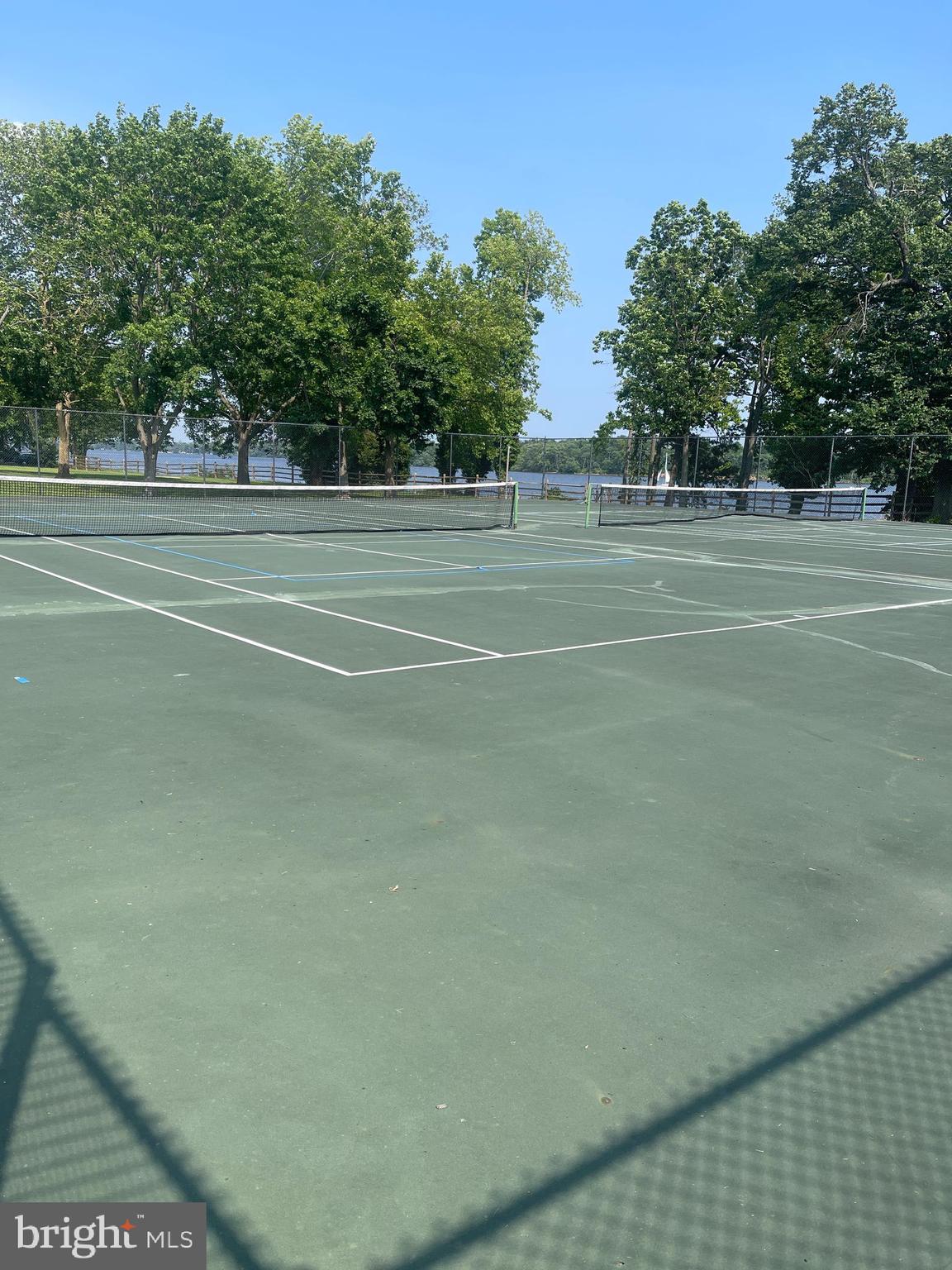 60201 Delaire Landing Road, Unit 201 Philadelphia, PA 19114 - Photo 34 of 49 a view of a tennis court
