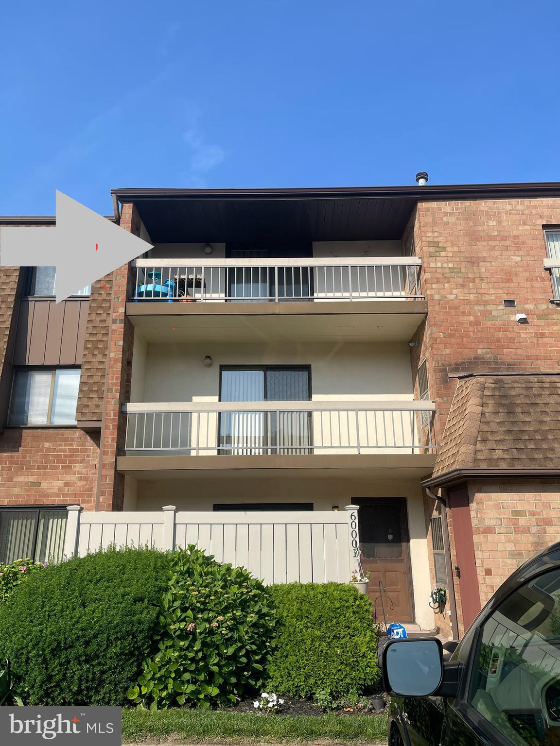 60201 Delaire Landing Road, Unit 201 Philadelphia, PA 19114 - Photo 44 of 49 a front view of a house with a yard