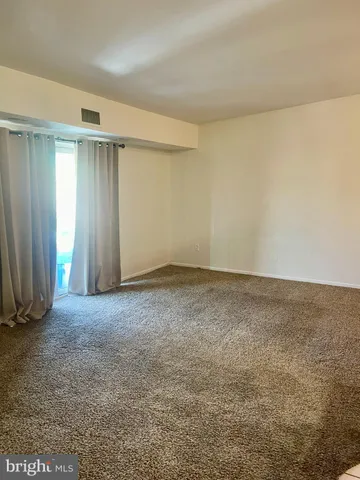 an empty room with an entryway