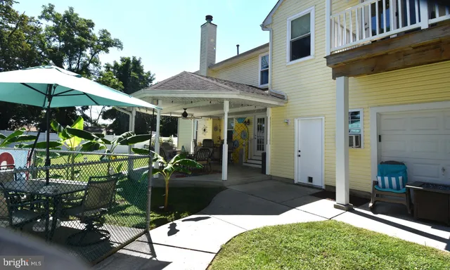 a view of swimming pool with a patio
