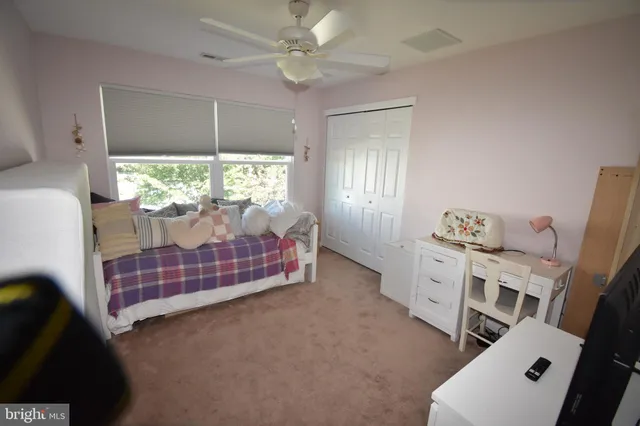 a view of a chairs and table in patio