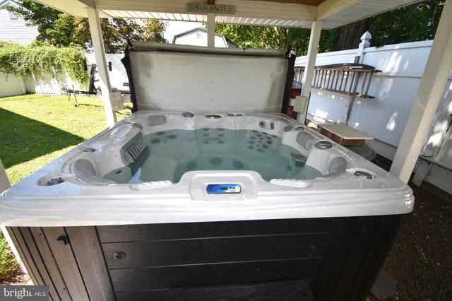 a view of a yard with a house in the background