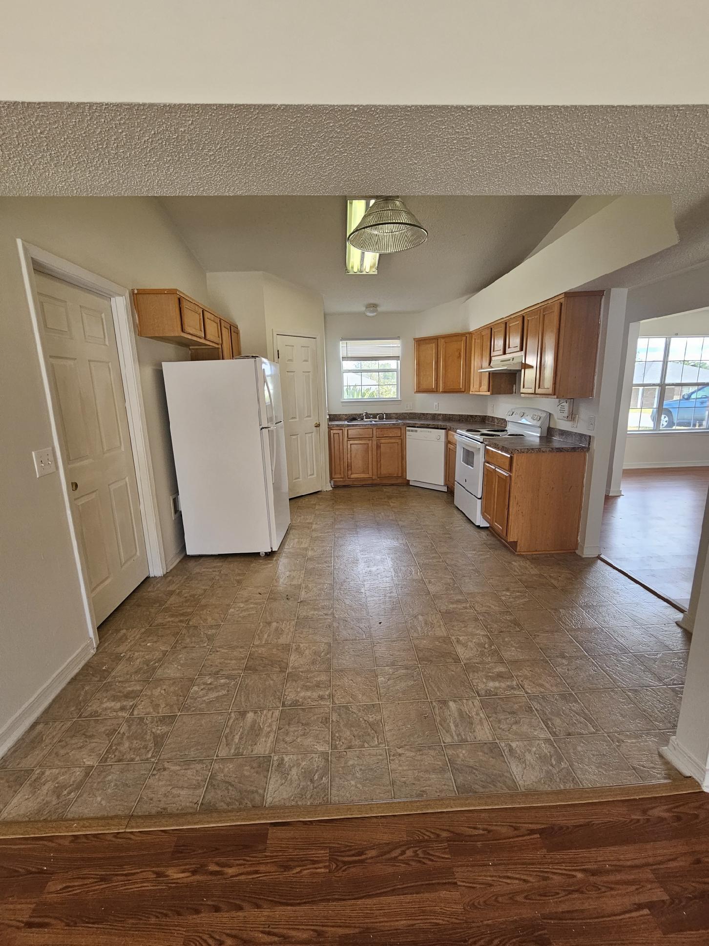 294 Limestone Circle Crestview, FL 32539 - Photo 11 of 19 a view of a kitchen with lots of counter space and appliances