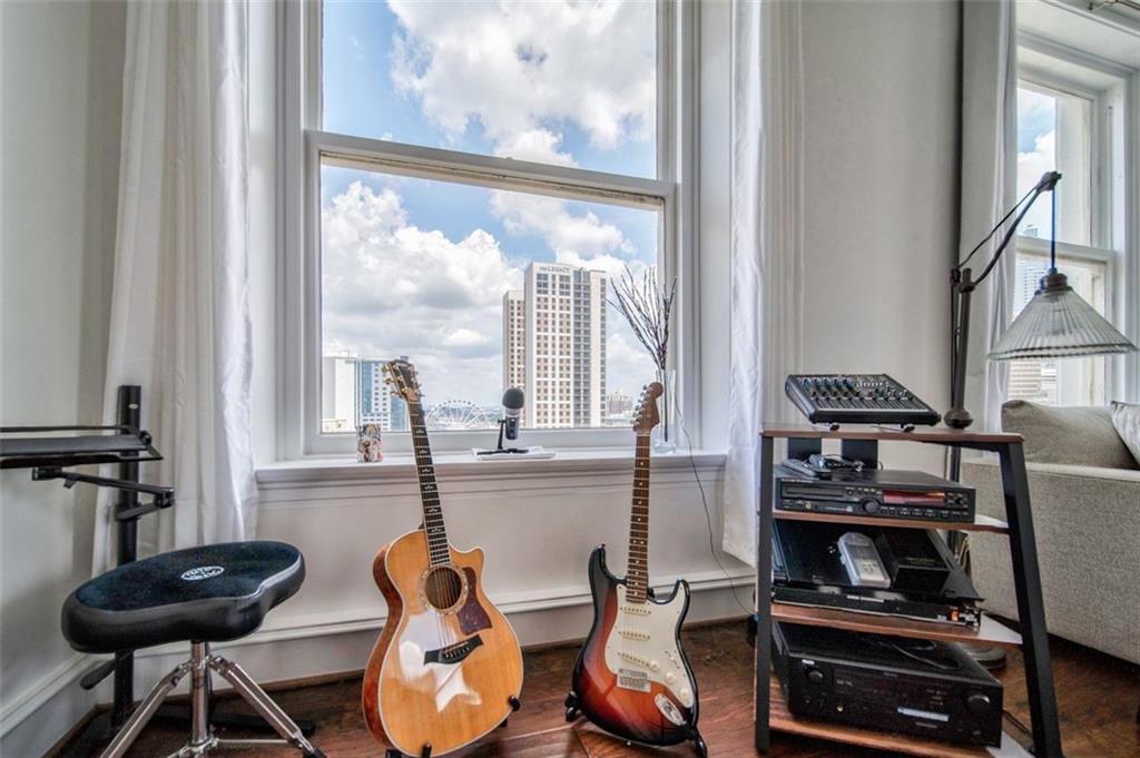 57 Forsyth Street Northwest, Unit 12B Atlanta, GA 30303 - Photo 9 of 38 a room with furniture and a window