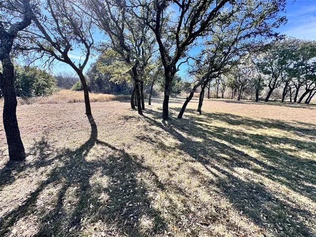 a bathroom with a toilet sink and vanity