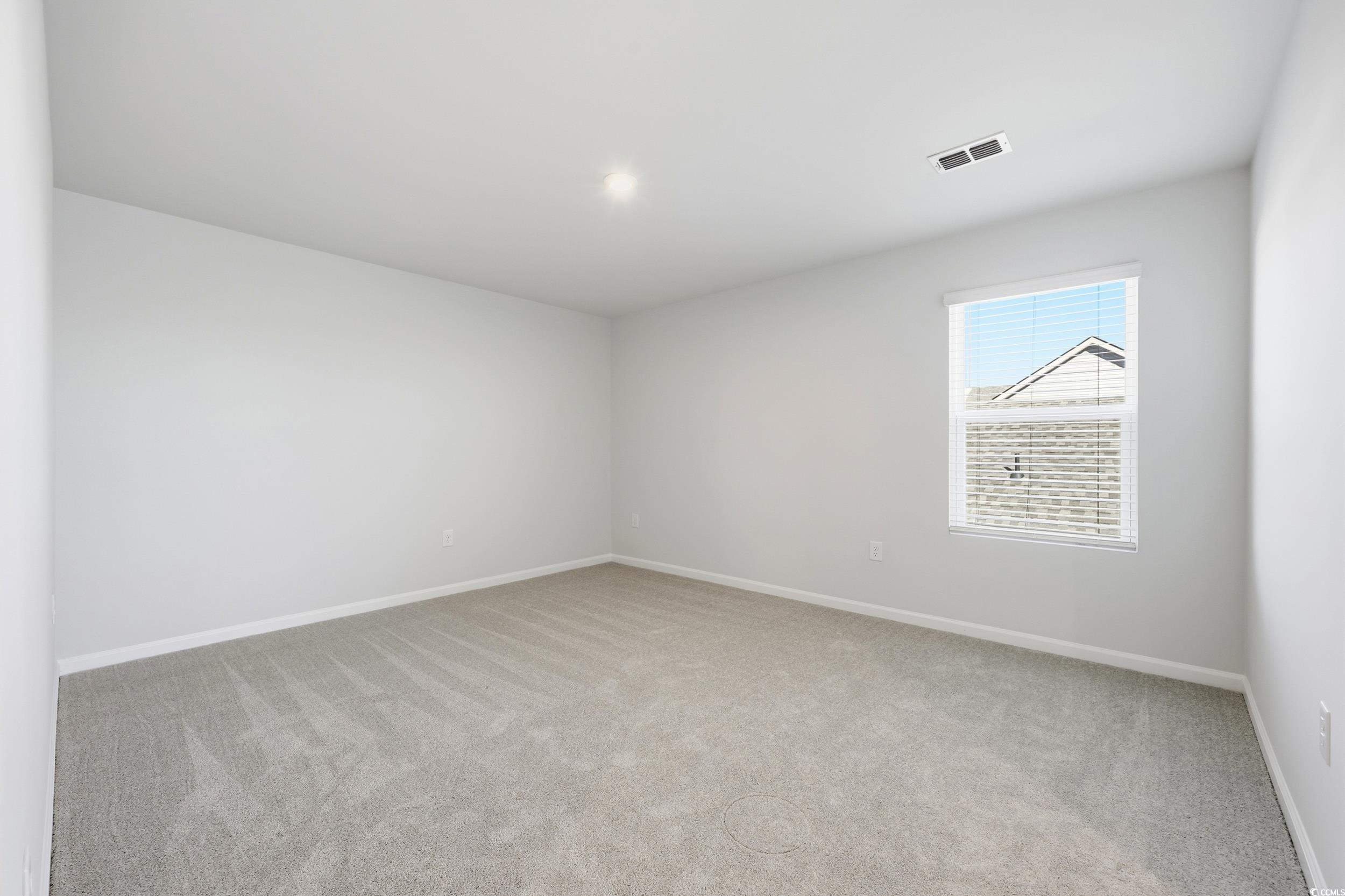 3055 Visionary Drive Myrtle Beach, SC 29588 - Photo 15 of 31 Spare room with light carpet and baseboards