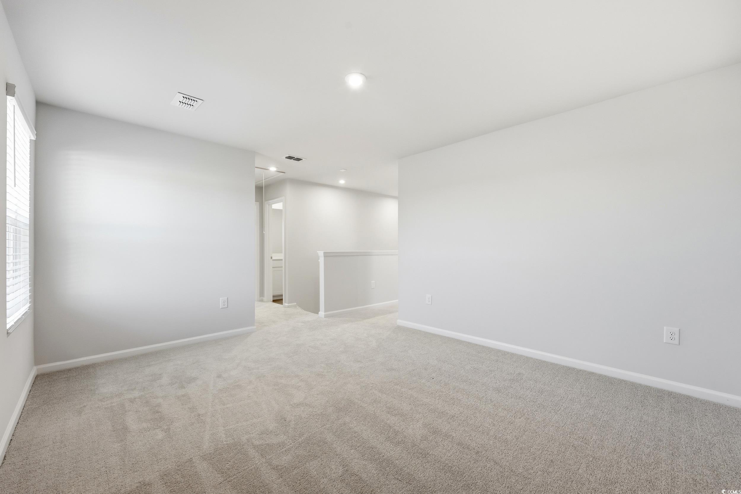 3055 Visionary Drive Myrtle Beach, SC 29588 - Photo 16 of 31 Unfurnished room with recessed lighting and light carpet