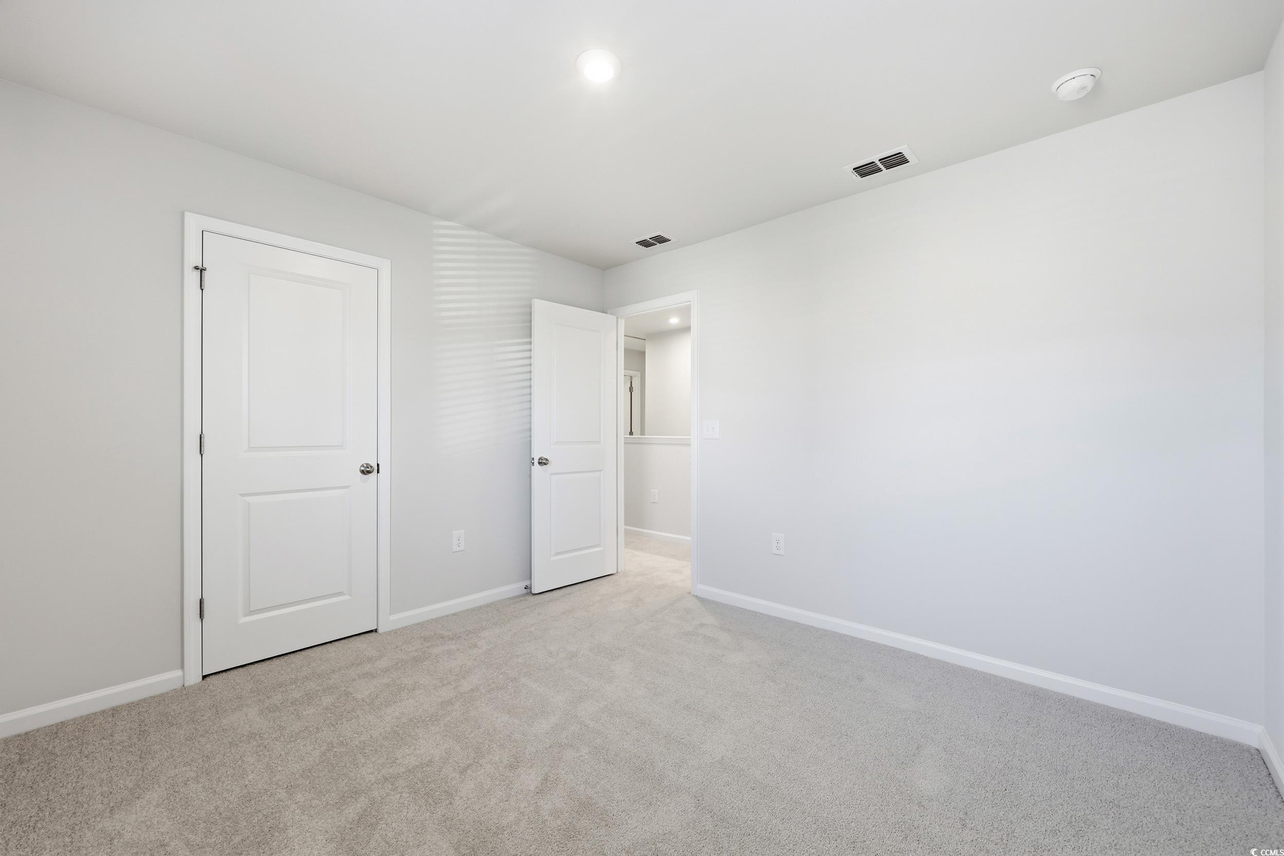 3055 Visionary Drive Myrtle Beach, SC 29588 - Photo 22 of 31 Unfurnished bedroom with light carpet and recessed lighting