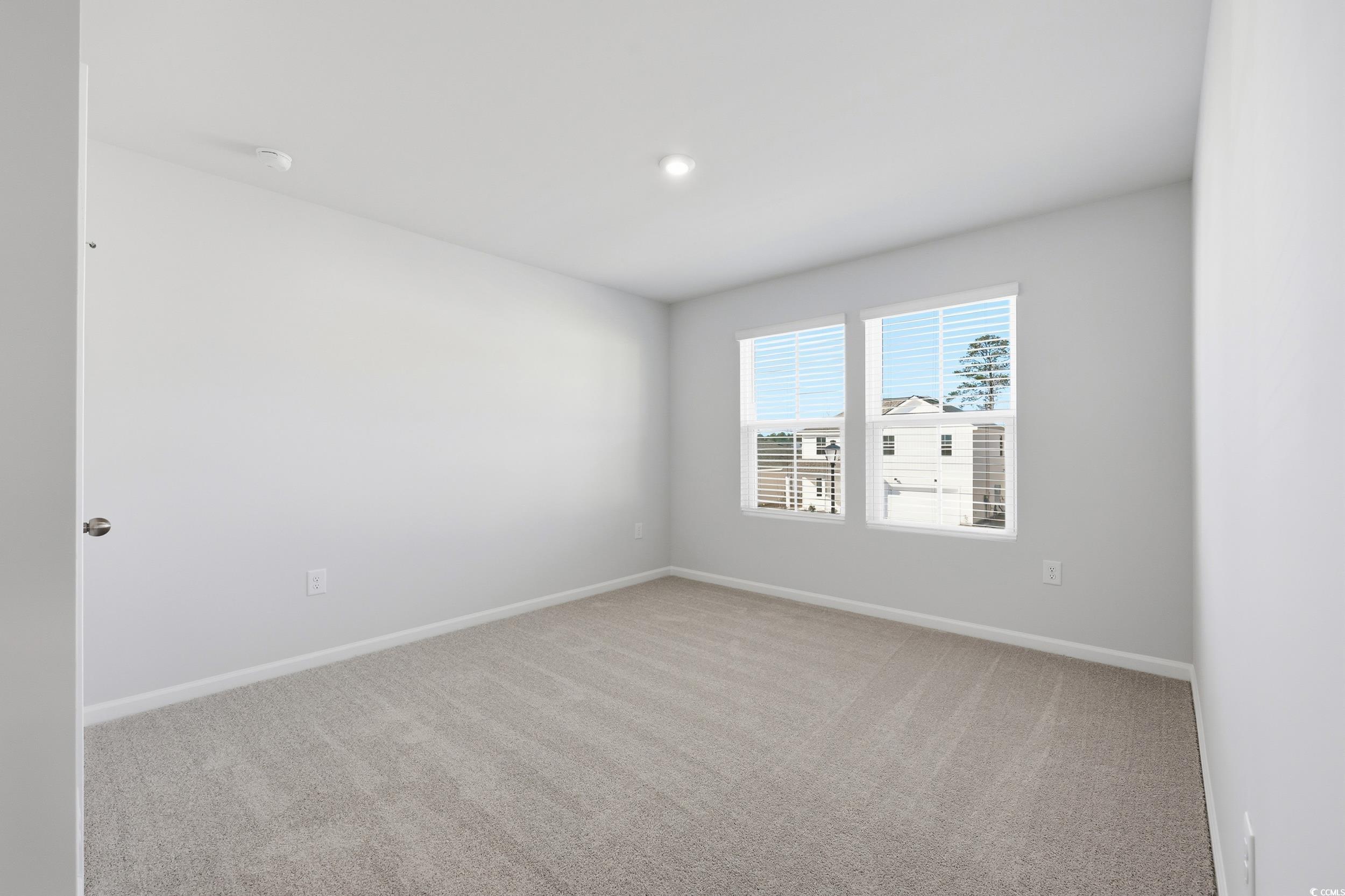 3055 Visionary Drive Myrtle Beach, SC 29588 - Photo 23 of 31 Spare room with light carpet and recessed lighting