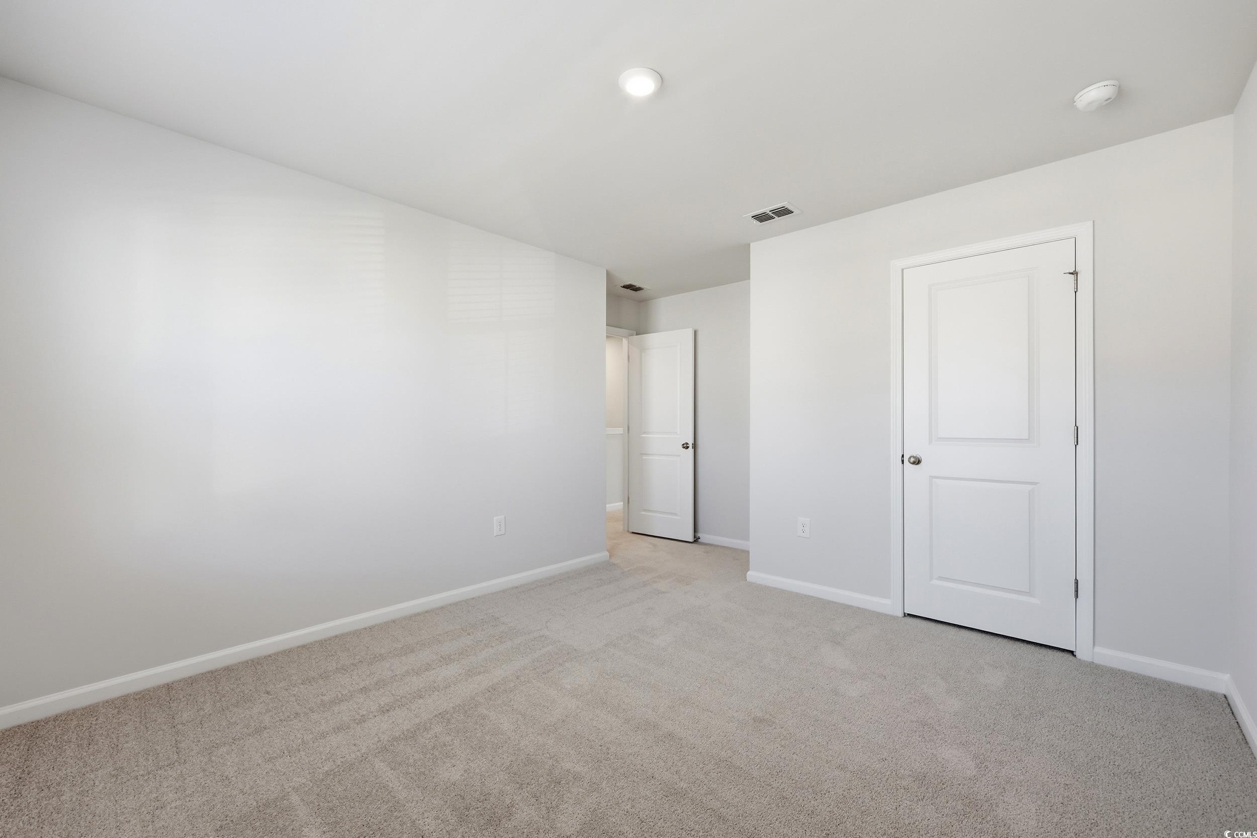 3055 Visionary Drive Myrtle Beach, SC 29588 - Photo 24 of 31 Unfurnished bedroom featuring carpet floors and baseboards