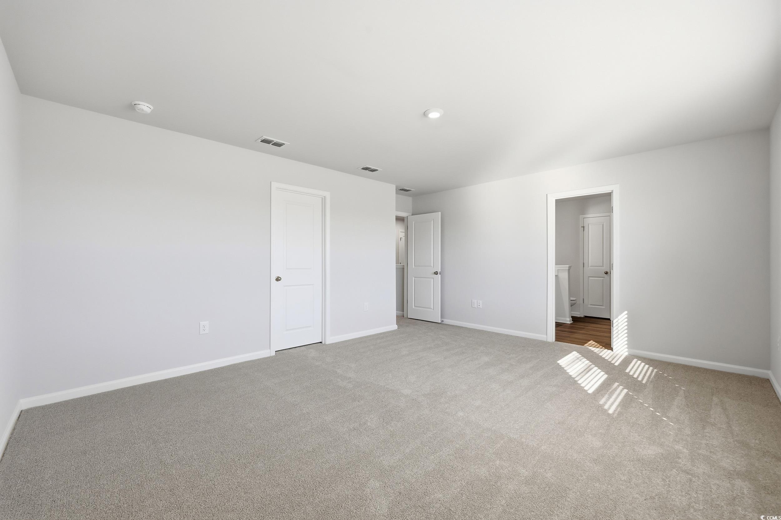 3055 Visionary Drive Myrtle Beach, SC 29588 - Photo 26 of 31 Unfurnished bedroom featuring carpet flooring and baseboards