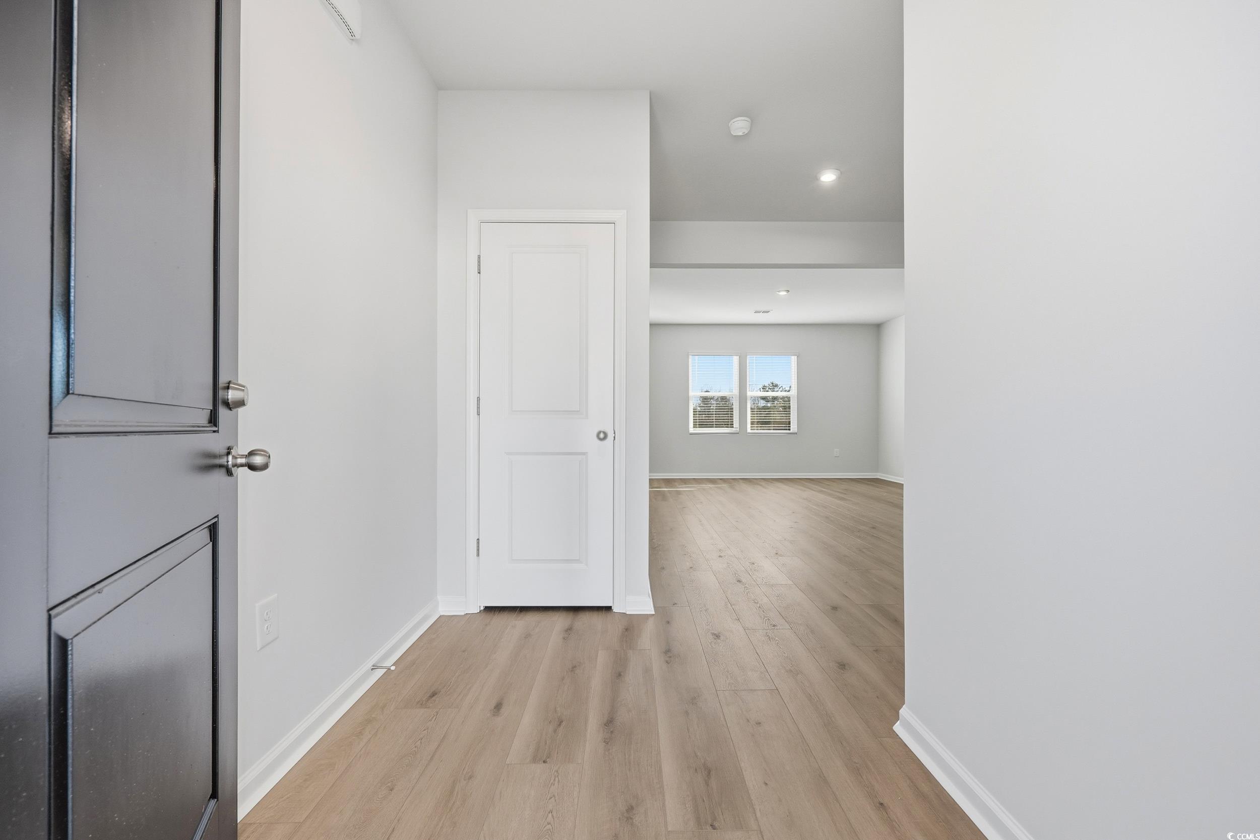 3055 Visionary Drive Myrtle Beach, SC 29588 - Photo 3 of 31 Hall featuring light wood-style flooring and baseboards