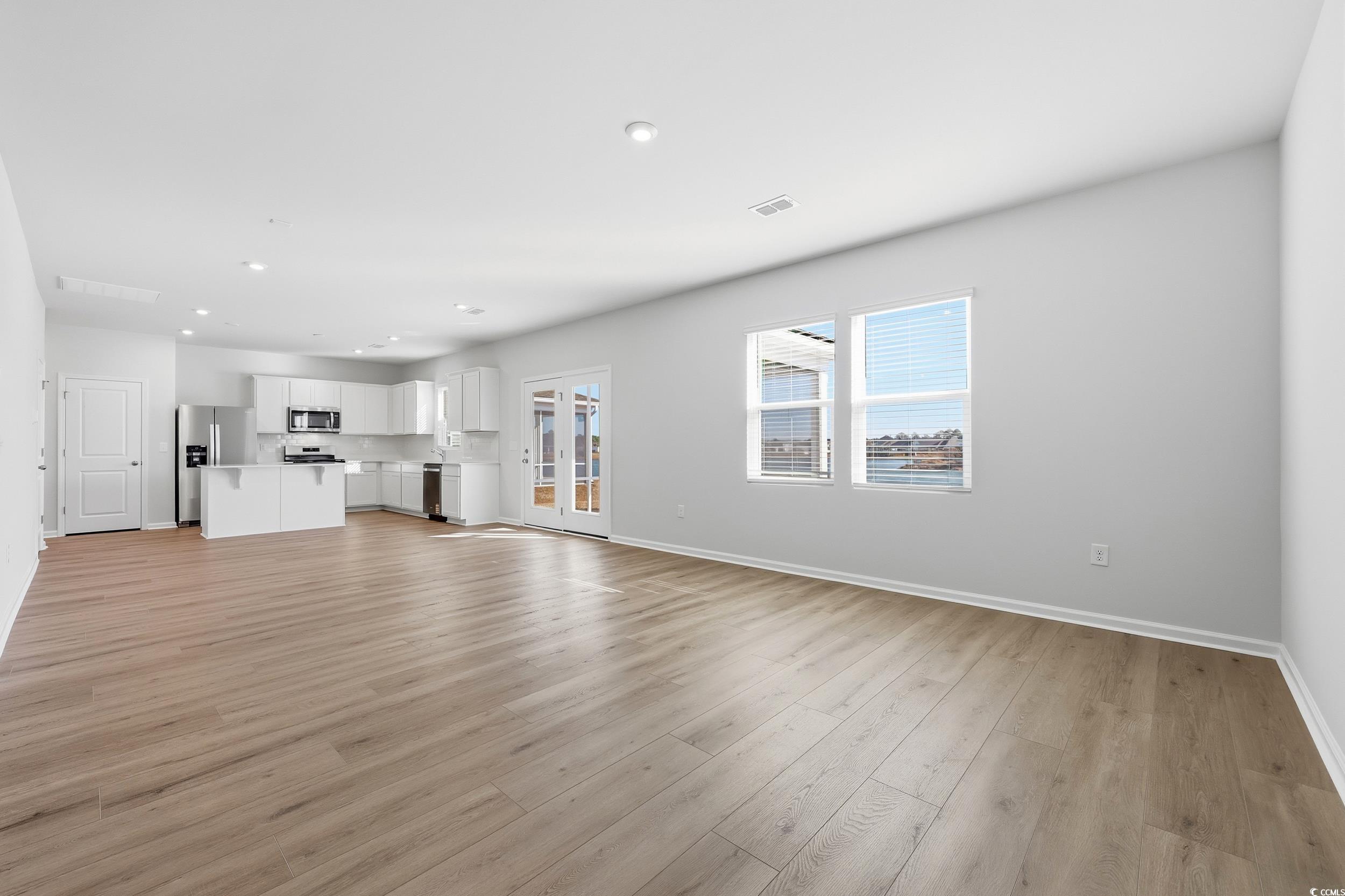 3055 Visionary Drive Myrtle Beach, SC 29588 - Photo 10 of 31 Unfurnished living room featuring recessed lighting and light wood-style flooring