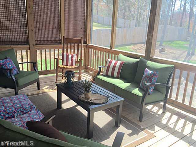 5083 Peppertree Road Clemmons, NC 27012 - Photo 15 of 16 Screened Porch. Endless days to enjoy the screened in porch.