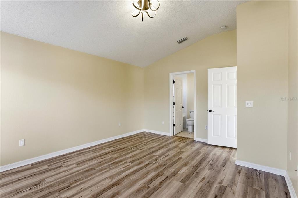 12923 Fieldmoor Court Riverview, FL 33579 - Photo 21 of 37 wooden floor in an empty room