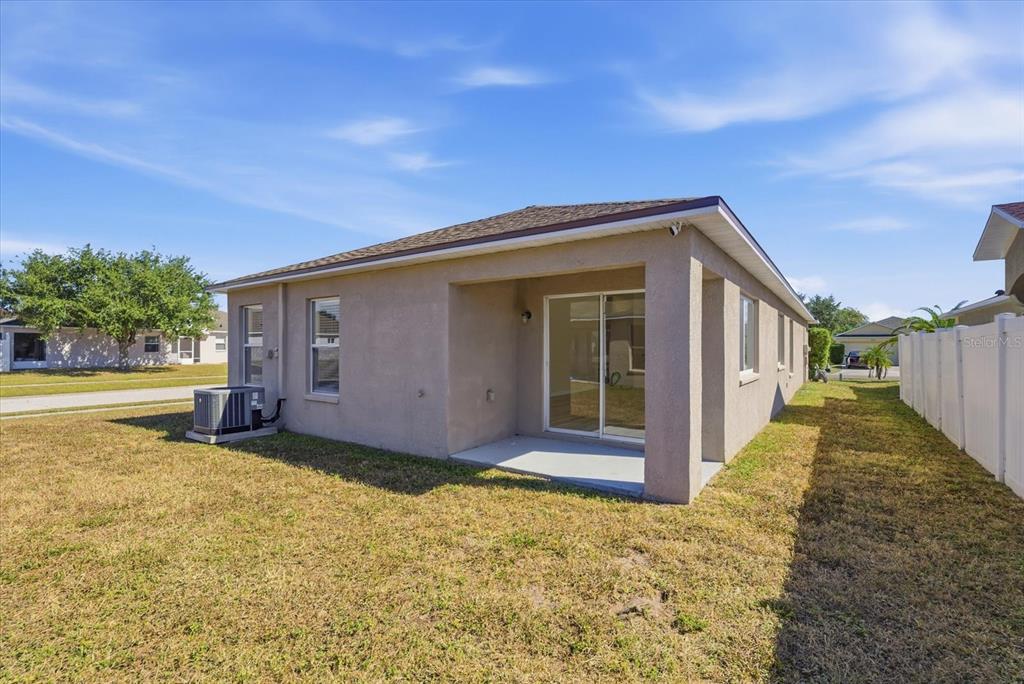 12923 Fieldmoor Court Riverview, FL 33579 - Photo 26 of 37 a view of a house with backyard and porch