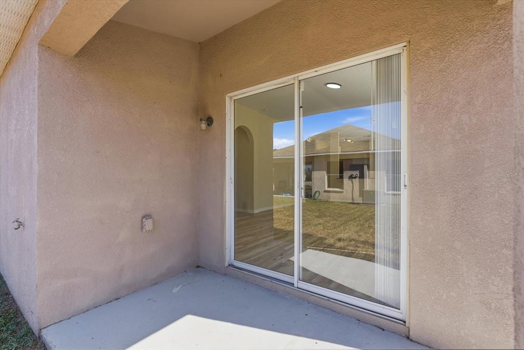 12923 Fieldmoor Court Riverview, FL 33579 - Photo 27 of 37 a view of a bathroom with a glass door