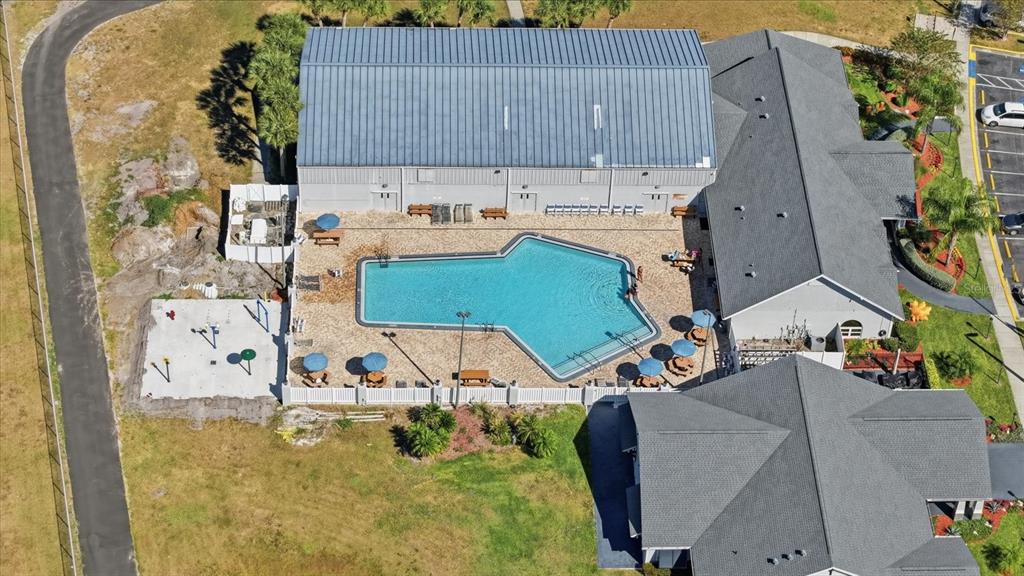 12923 Fieldmoor Court Riverview, FL 33579 - Photo 30 of 37 an aerial view of a house with swimming pool and large trees