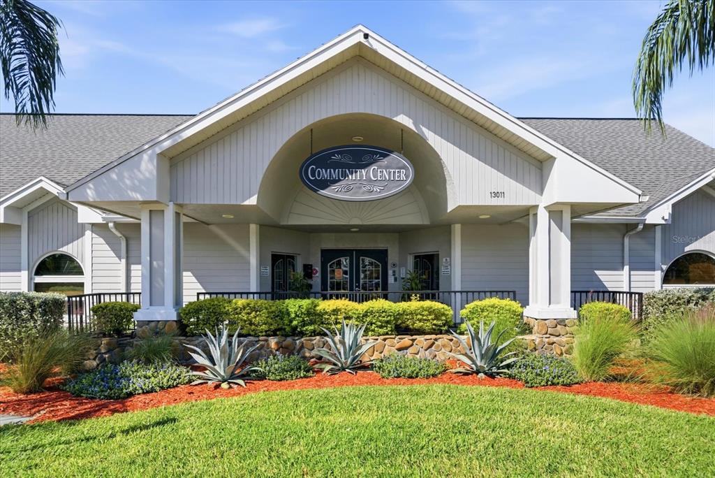 12923 Fieldmoor Court Riverview, FL 33579 - Photo 36 of 37 a view of a house with a small yard plants and large tree