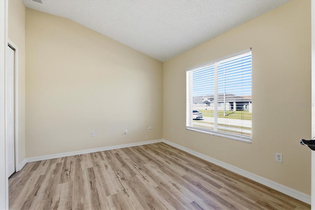 12923 Fieldmoor Court Riverview, FL 33579 - Photo 5 of 37 an empty room with a window