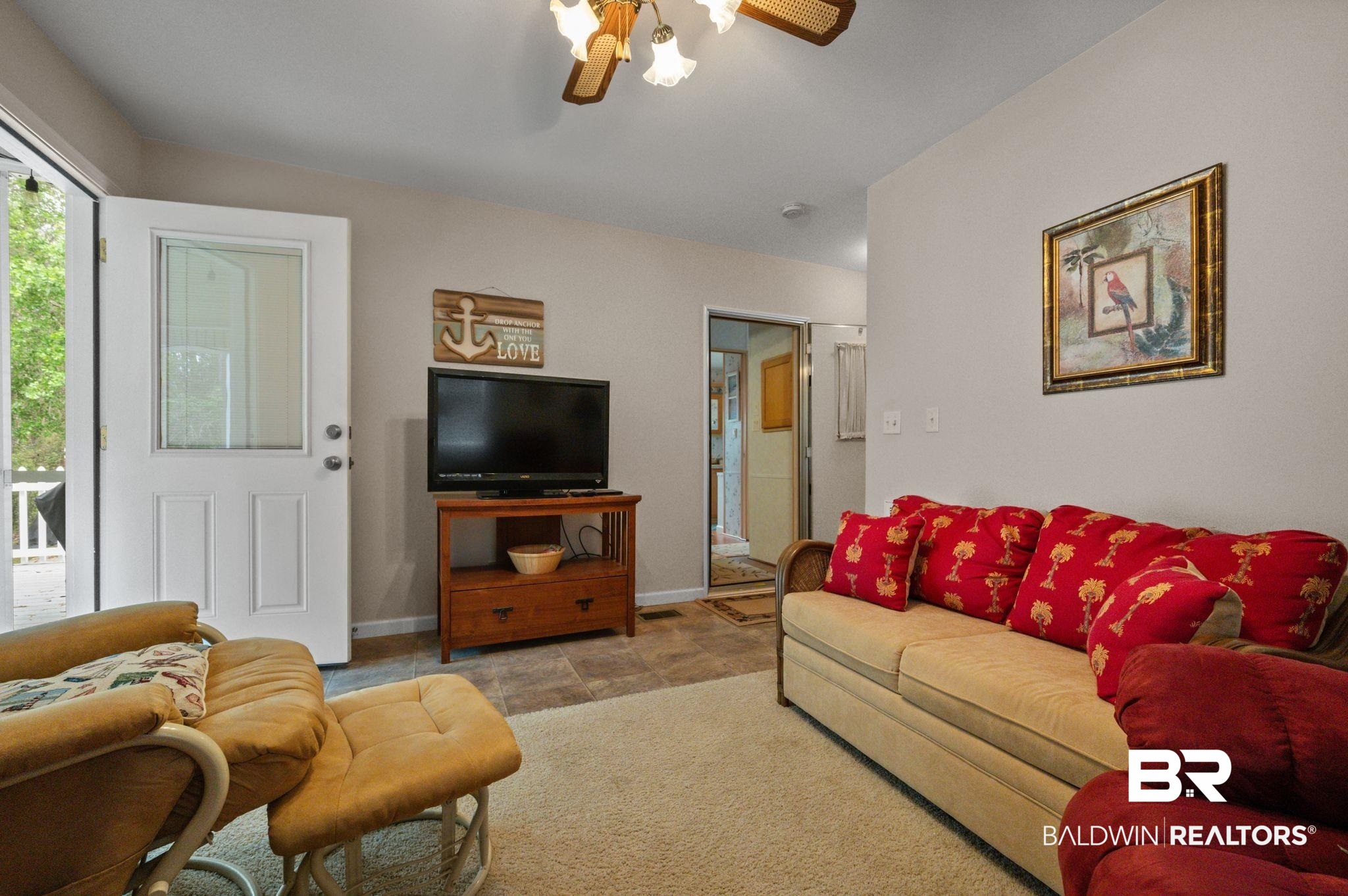 24711 County Road 20, Unit A11 Elberta, AL 36530 - Photo 9 of 35 Living area featuring ceiling fan and baseboards