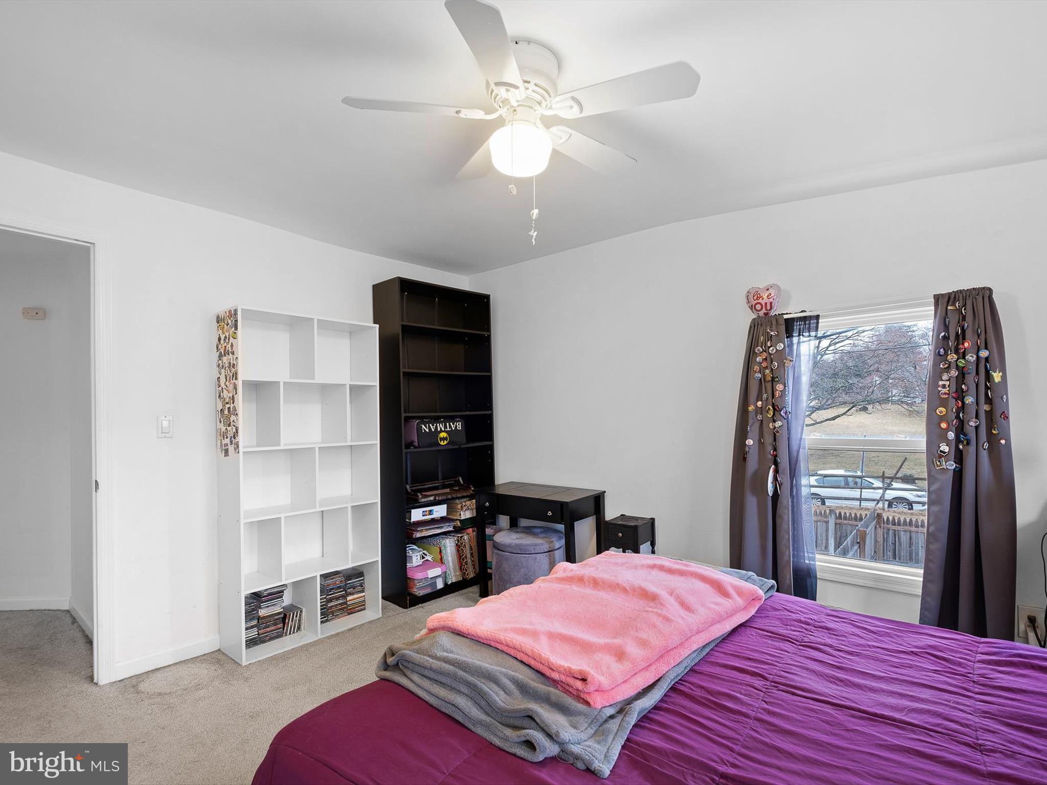 1820 Newport Road Wilmington, DE 19808 - Photo 14 of 20 a bed room with a bed and a book shelf