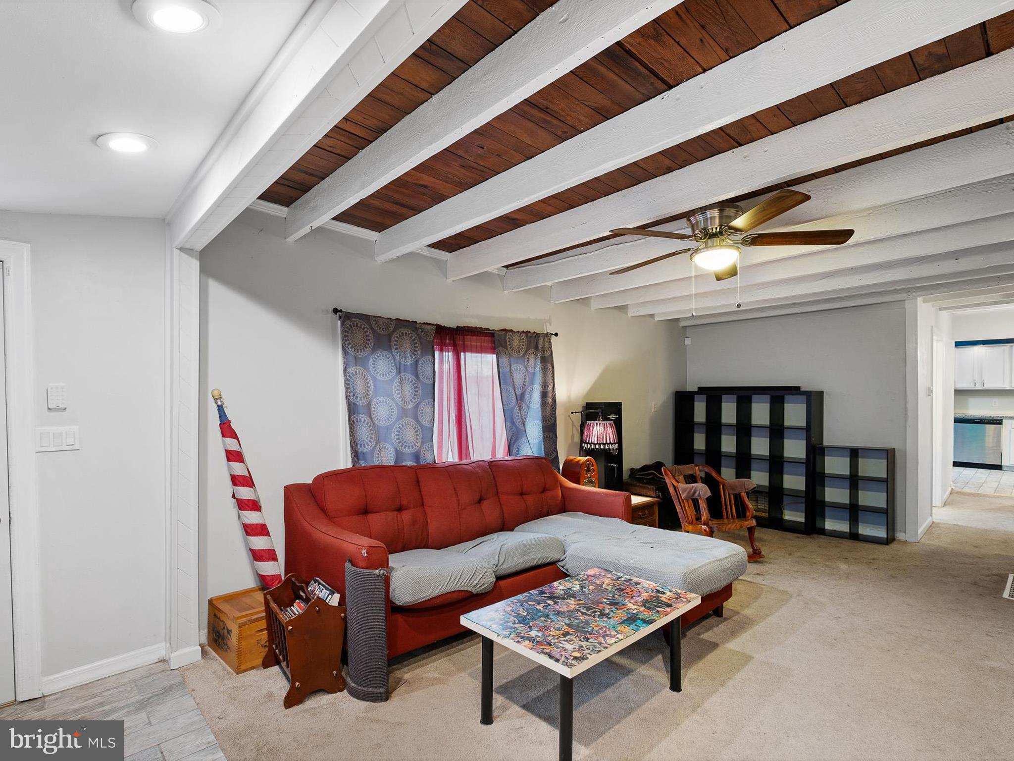 1820 Newport Road Wilmington, DE 19808 - Photo 6 of 20 a living room with furniture a rug and a window