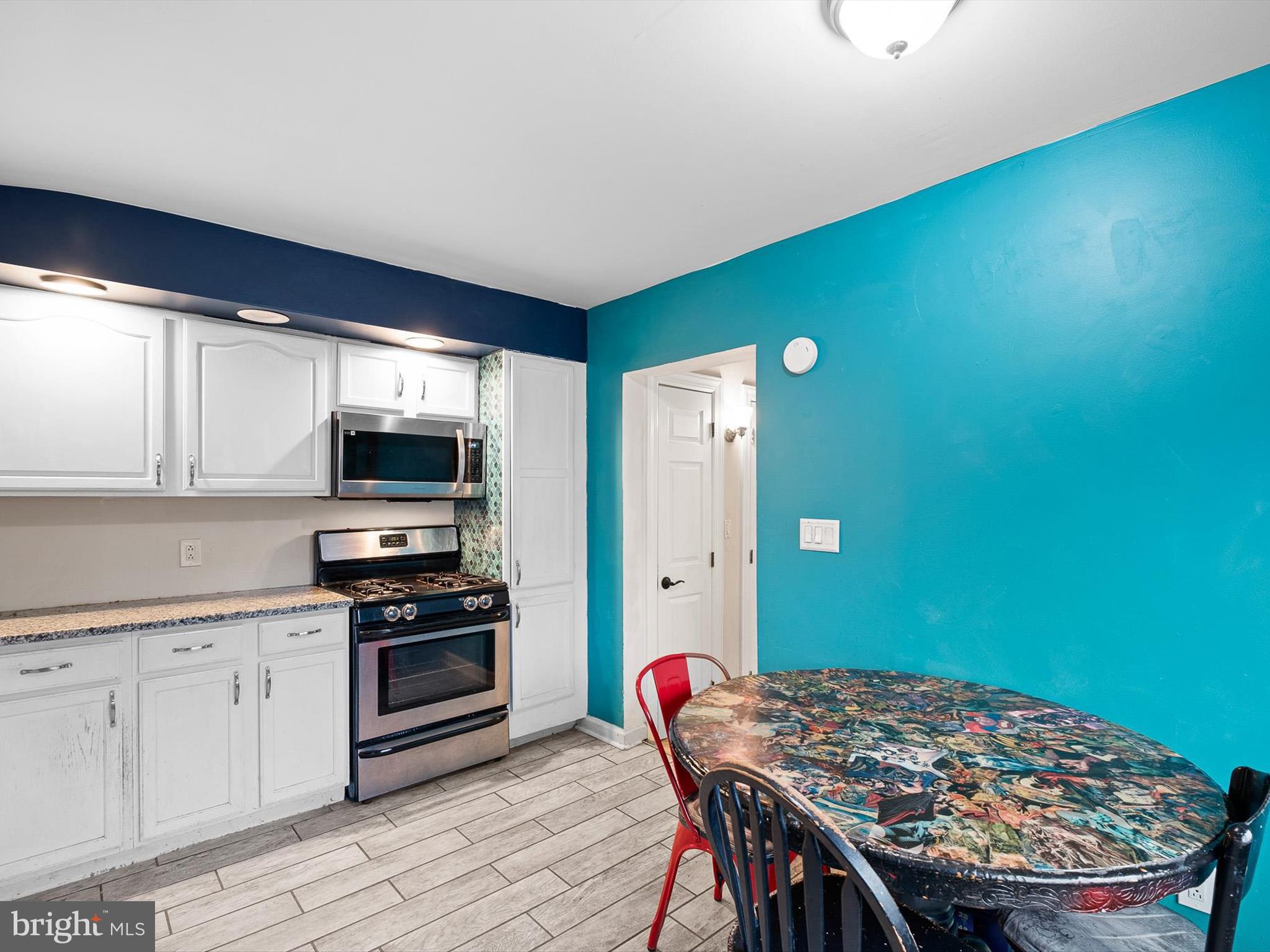 1820 Newport Road Wilmington, DE 19808 - Photo 8 of 20 a kitchen with stainless steel appliances a stove a sink refrigerator and a microwave