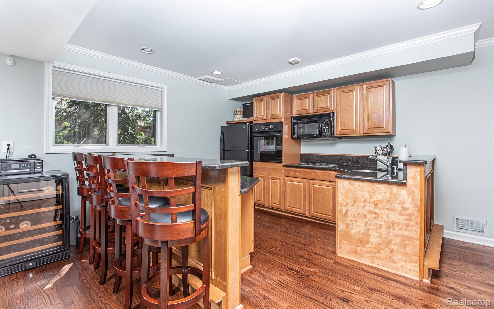 1915 Catlin Drive Rochester, MI 48306 - Photo 30 of 39 30 - Basement Kitchen & Bar.jpg