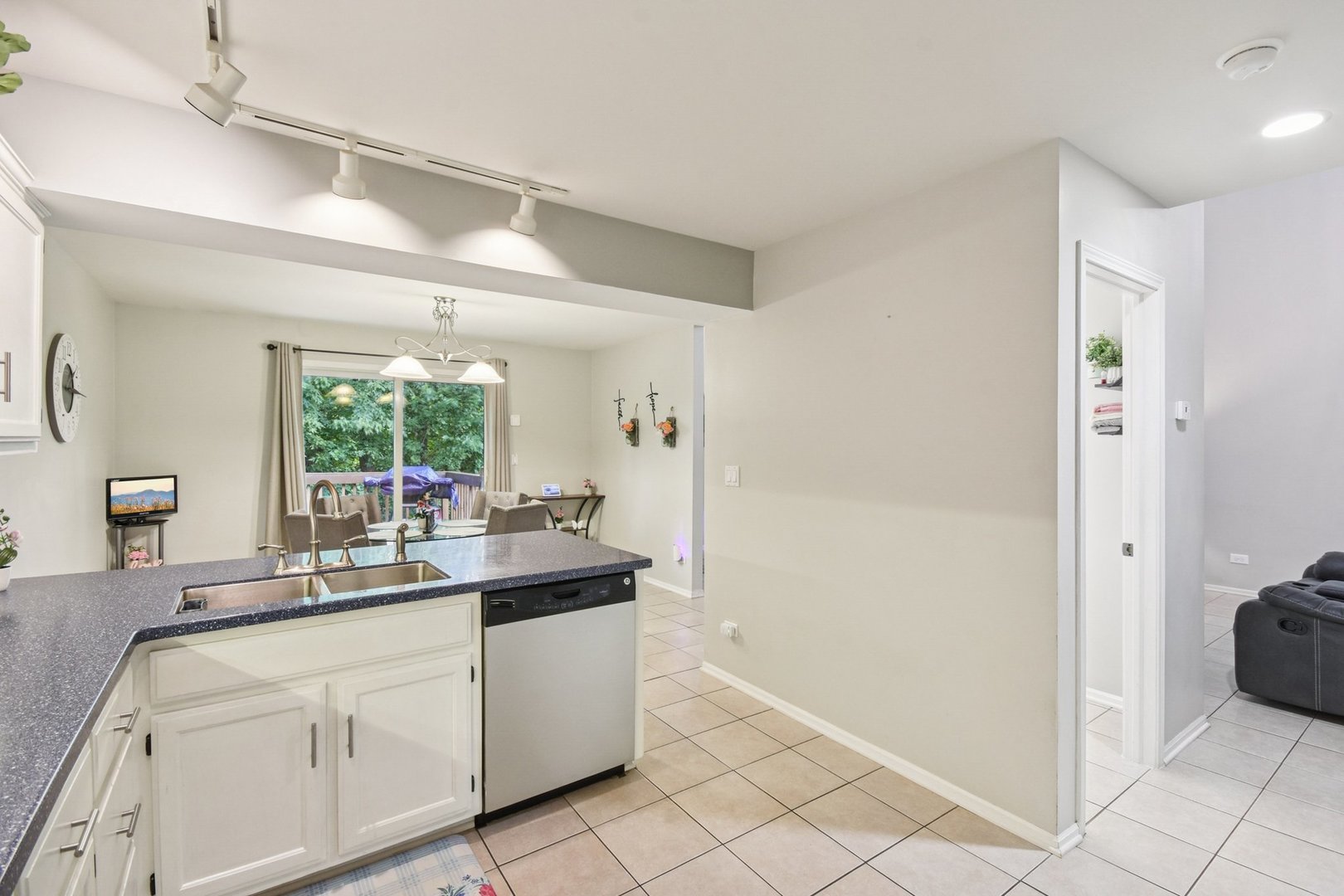 102 Ravinia Drive Shorewood, IL 60404 - Photo 12 of 30 a kitchen with a sink and cabinets