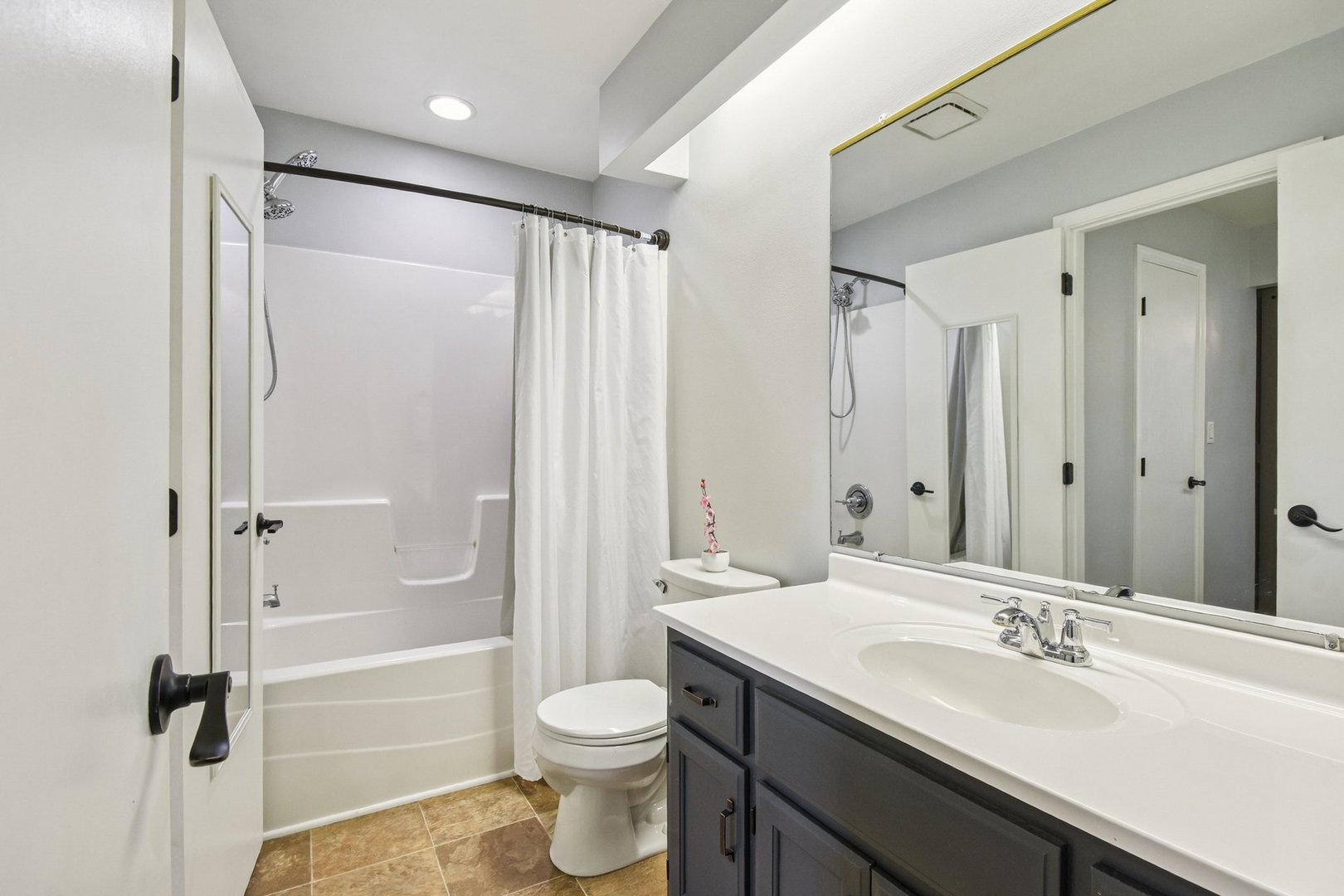 102 Ravinia Drive Shorewood, IL 60404 - Photo 20 of 30 a bathroom with a granite countertop sink toilet and shower