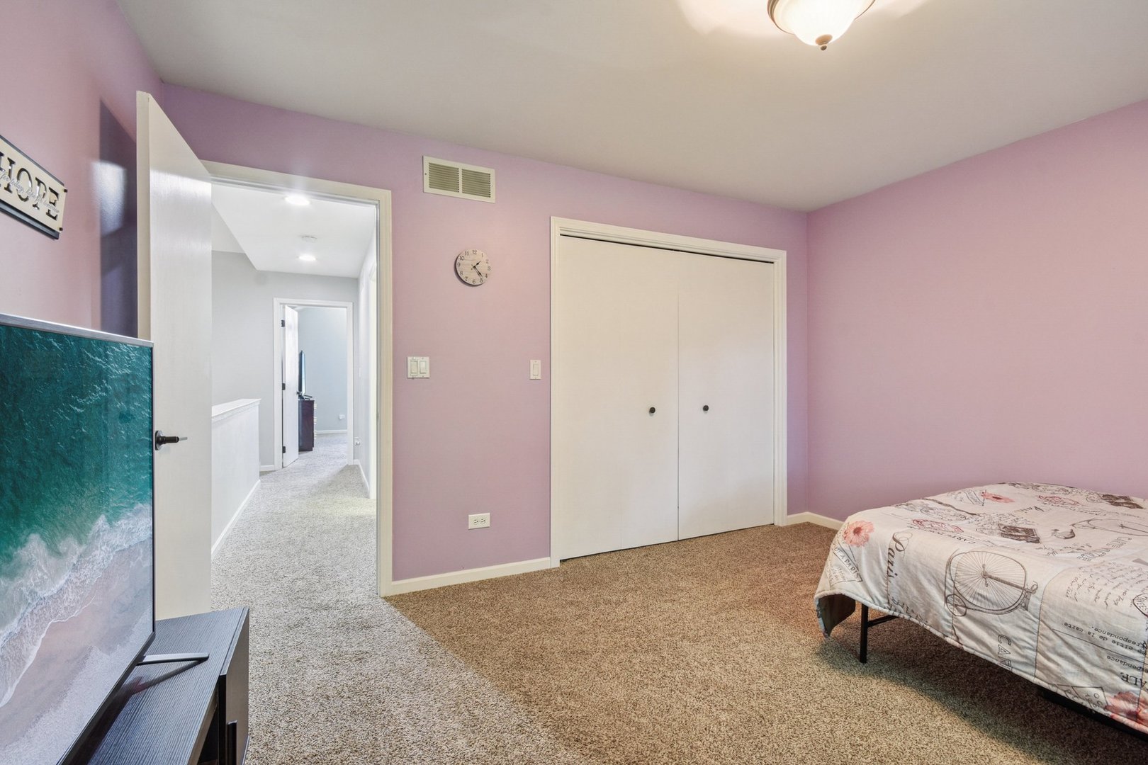 102 Ravinia Drive Shorewood, IL 60404 - Photo 22 of 30 a bedroom with a bed and closet