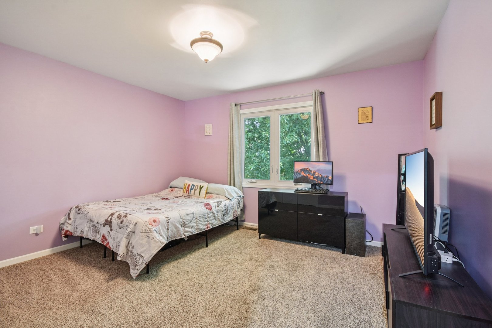 102 Ravinia Drive Shorewood, IL 60404 - Photo 23 of 30 a bedroom with a bed and a flat screen tv