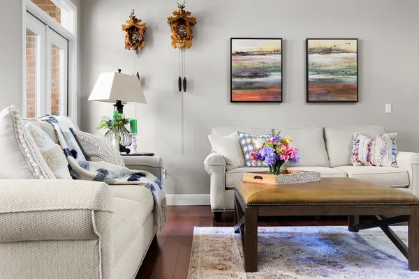 a living room with furniture and a table