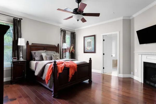 a bed room with a bed and a fireplace