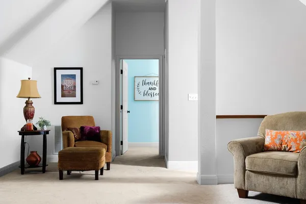a living room with furniture and a couch