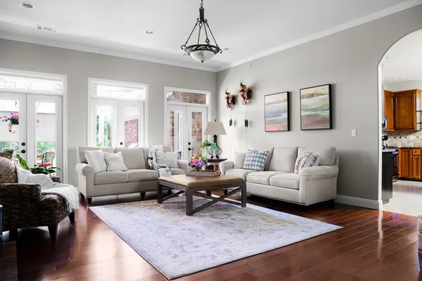 a living room with furniture or couch and a dining table