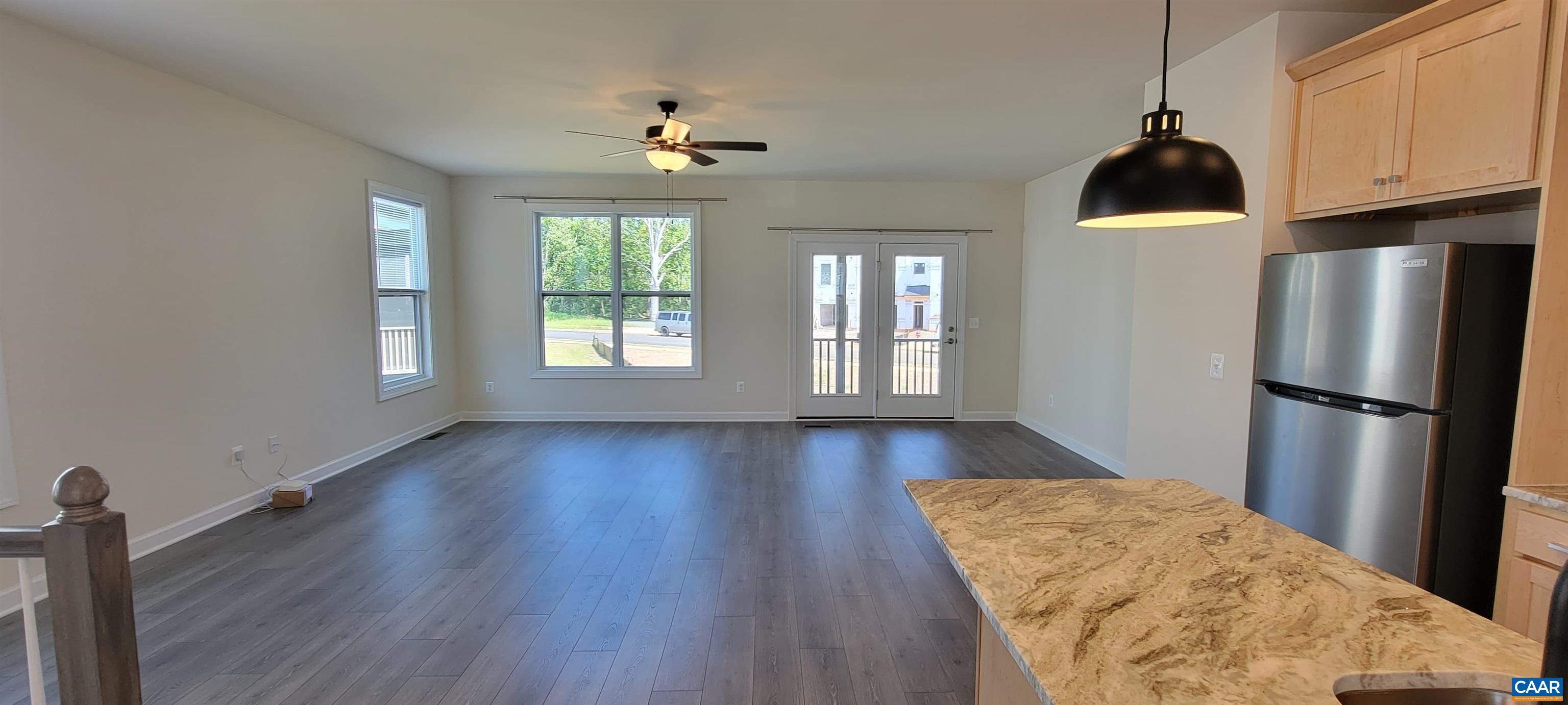 2245 Fowler Street Charlottesville, VA 22901 - Photo 15 of 38 a view of a room with wooden floor closet and windows