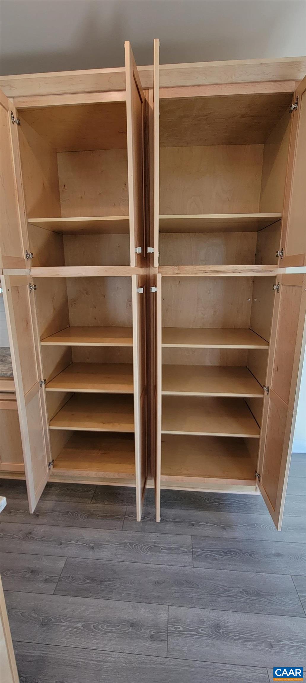 2245 Fowler Street Charlottesville, VA 22901 - Photo 16 of 38 a view of walk in closet with empty racks