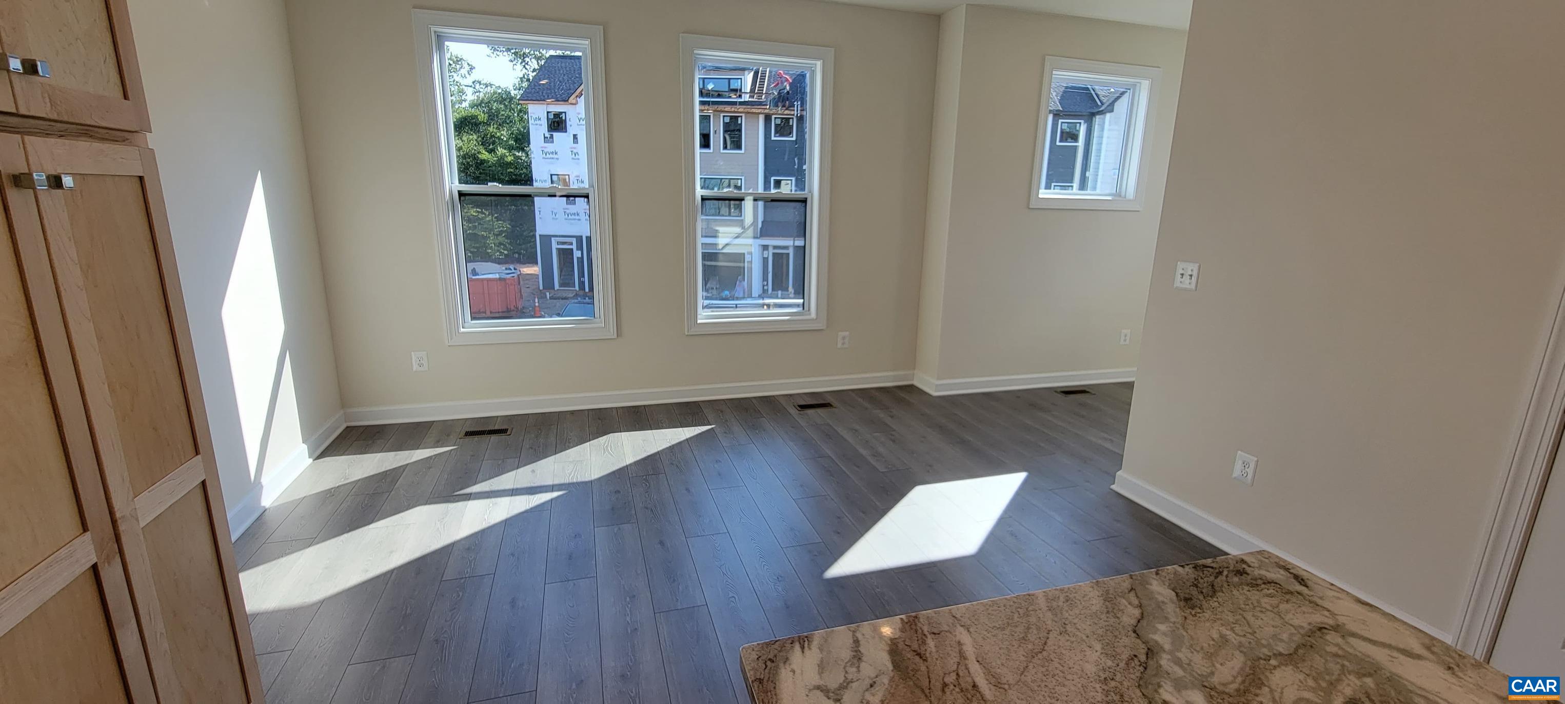 2245 Fowler Street Charlottesville, VA 22901 - Photo 19 of 38 a living room with furniture and a window