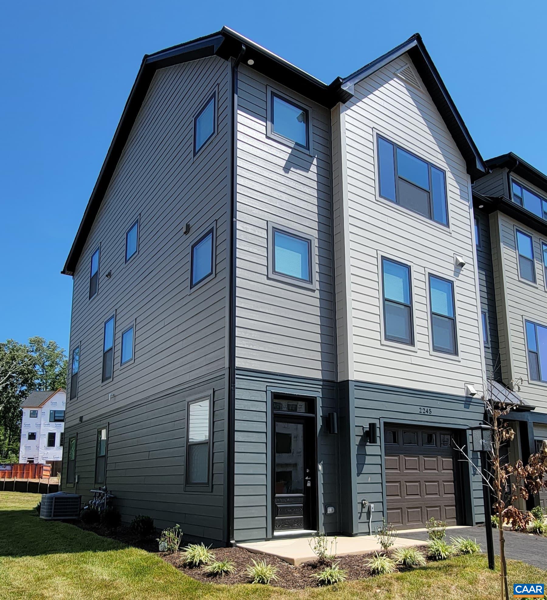 2245 Fowler Street Charlottesville, VA 22901 - Photo 2 of 38 a front view of a house with a yard