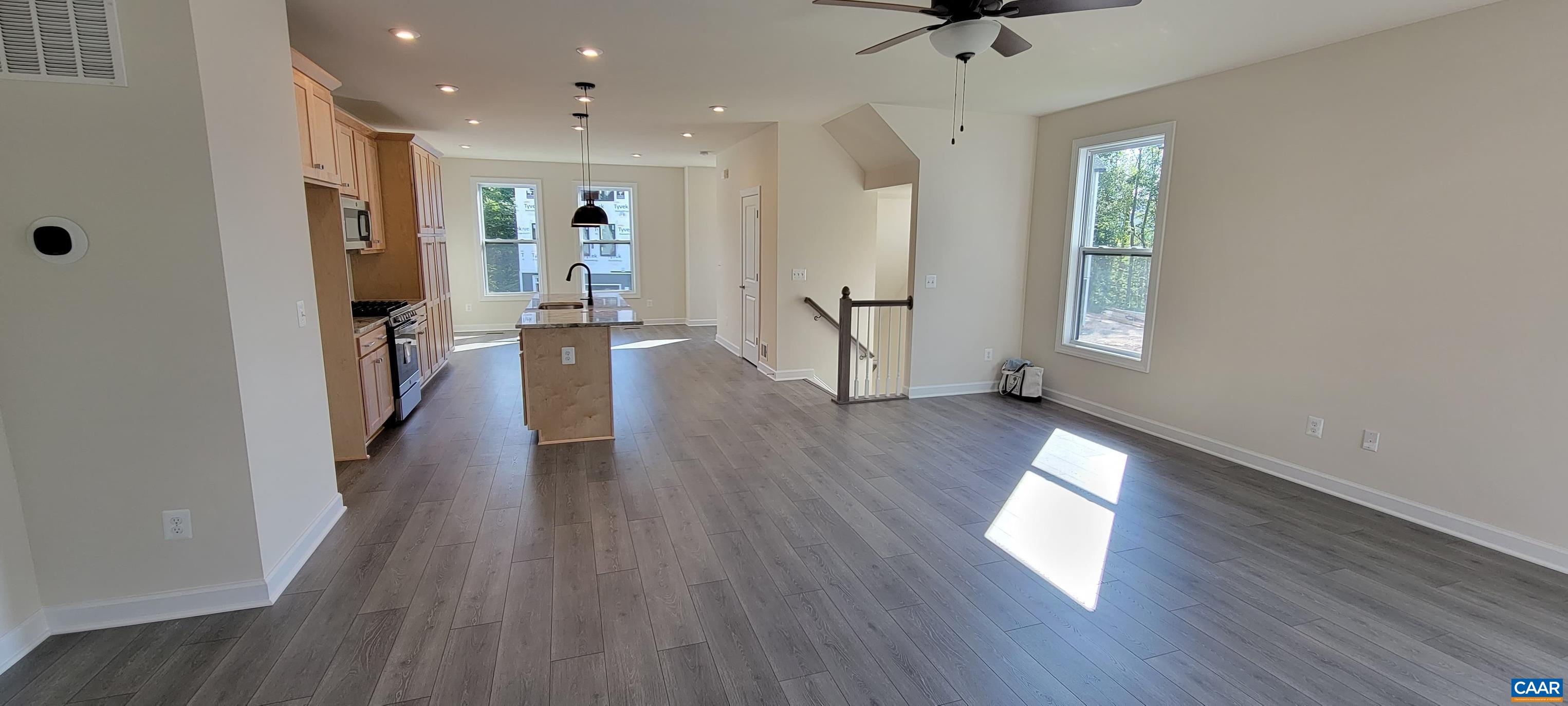 2245 Fowler Street Charlottesville, VA 22901 - Photo 21 of 38 wooden floor in an empty room with a window