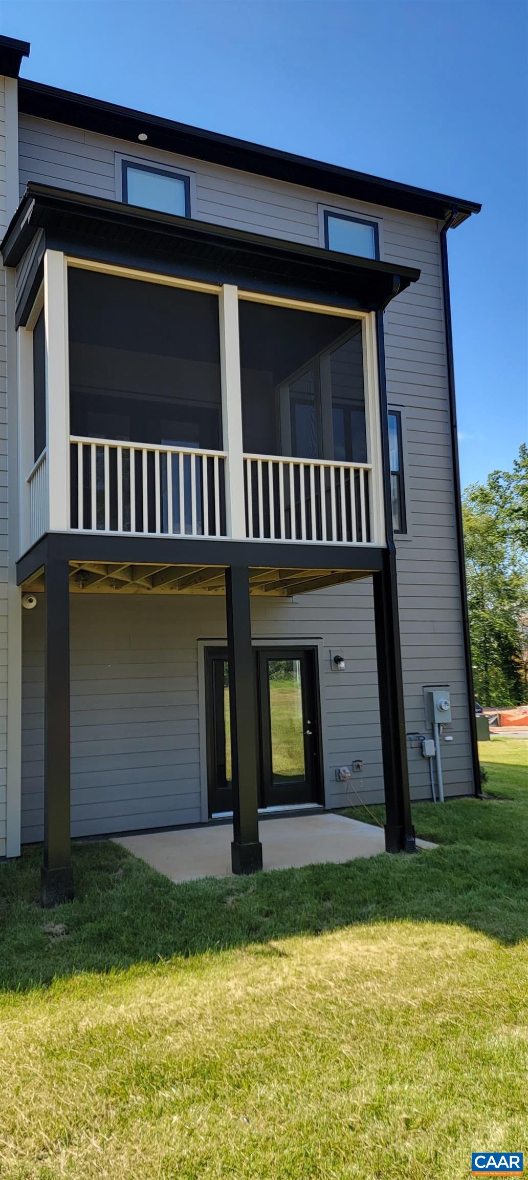 2245 Fowler Street Charlottesville, VA 22901 - Photo 36 of 38 a front view of a house with a yard and garage