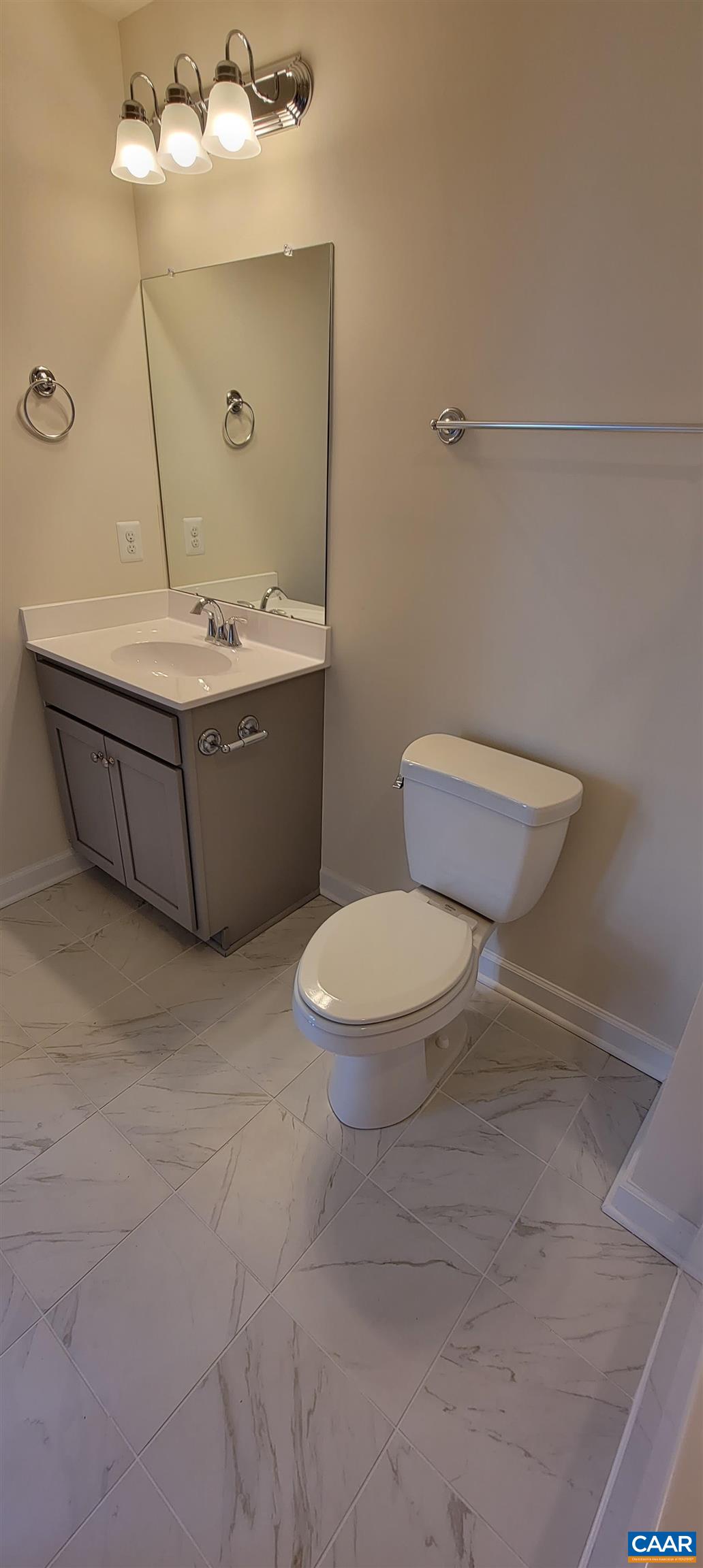 2245 Fowler Street Charlottesville, VA 22901 - Photo 6 of 38 a bathroom with a toilet a sink and mirror