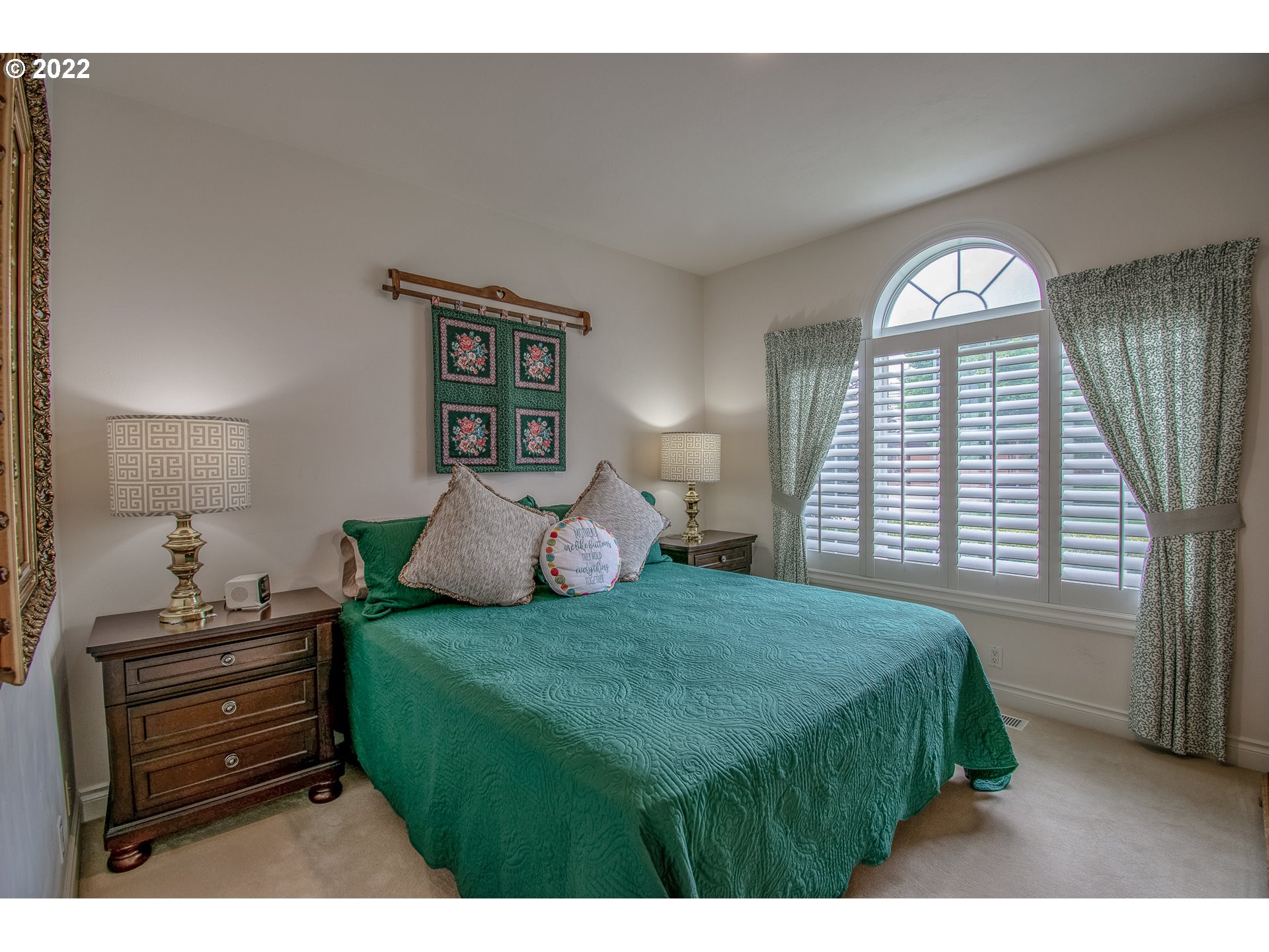 2679 Riverwalk Loop Eugene, OR 97401 - Photo 16 of 32 a bedroom with a bed and a window