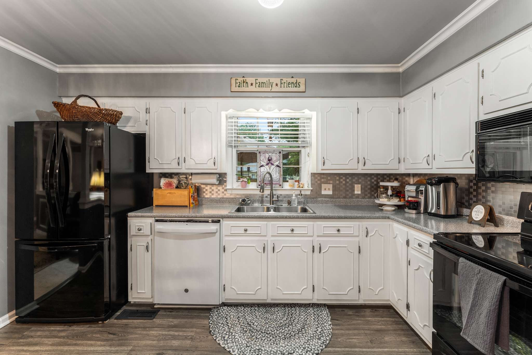 513 Rose Circle Murfreesboro, TN 37128 - Photo 14 of 37 a kitchen with a sink stove and cabinets